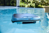 Dolphin Skimmi 300 solar robotic pool skimmer operating on the pool surface