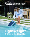 Dolphin Skimmi 300 lightweight robotic pool skimmer being placed into a swimming pool
