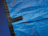 Close-up of Yard Guard above-ground winter pool cover reinforced edge and nylon loop